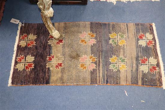 A Bokhara peach ground rug and three Turkish geometric rugs, largest 200 x 100cm.